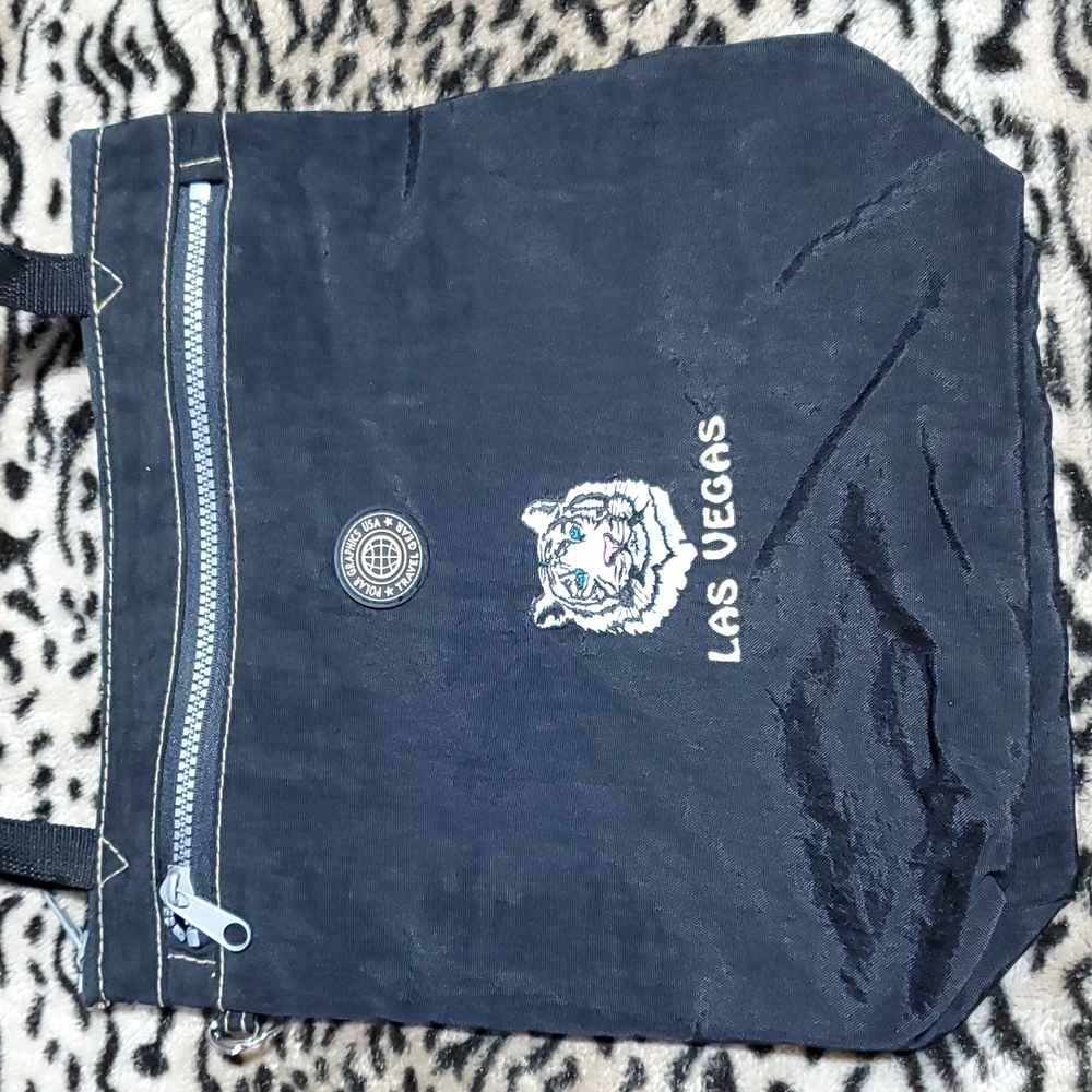 Unique right out of Mirage Vegas bag.